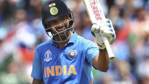 India's Shikhar Dhawan raises his bat to celebrate against Australia.(AP) India's Shikhar Dhawan raises his bat to celebrate against Australia.(AP)