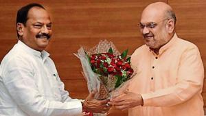 Chief minister Raghubar Das with Union home minister and BJP President Amit Shah during a meeting at BJP headquarters in New Delhi.(HTPhotos) Chief minister Raghubar Das with Union home minister and BJP President Amit Shah during a meeting at BJP headquarters in New Delhi.(HTPhotos)