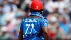Afghanistan's Mohammad Shahzad looks dejected as he walks off after losing his wicket to Australia's Mitchell Starc.(Action Images via Reuters) Afghanistan's Mohammad Shahzad looks dejected as he walks off after losing his wicket to Australia's Mitchell Starc.(Action Images via Reuters)