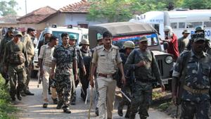 Additional police force rushed to Purihasa village after locals refused to release the woman they accused of being a witch.(Manoj Kumar / HT Photo) Additional police force rushed to Purihasa village after locals refused to release the woman they accused of being a witch.(Manoj Kumar / HT Photo)