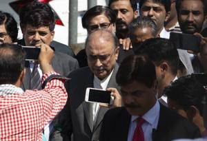 Former Pakistani president Asif Ali Zardari leaves the High Court in Islamabad on Monday.(AP Photo)
