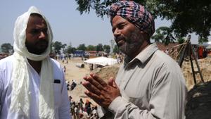Fatehveer’s grandfather Rohi Singh prays for his early evacuation from the borewell, at Bhagwanpur village, in Sangrur district of Punjab, India, on Monday, June 10, 2019.((Photo by Bharat Bhushan / Hindustan Times)) Fatehveer’s grandfather Rohi Singh prays for his early evacuation from the borewell, at Bhagwanpur village, in Sangrur district of Punjab, India, on Monday, June 10, 2019.((Photo by Bharat Bhushan / Hindustan Times))