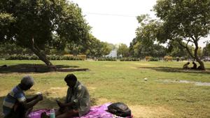 Indians sit under the shade of trees to beat the heat in New Delhi, India, Monday, June 10, 2019. Severe heat wave conditions are sweeping north and western parts of India with maximum temperature soaring to 48 degree Celsius (118 F) in some parts of Rajasthan state. (AP Photo/Manish Swarup)(AP) Indians sit under the shade of trees to beat the heat in New Delhi, India, Monday, June 10, 2019. Severe heat wave conditions are sweeping north and western parts of India with maximum temperature soaring to 48 degree Celsius (118 F) in some parts of Rajasthan state. (AP Photo/Manish Swarup)(AP)