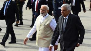 Sri Lankan Prime Minister Ranil Wickremesinghe walks with Prime Minister Narendra Modi, Bandaranaike International Airport, Colombo, June 9, 2019(AFP) Sri Lankan Prime Minister Ranil Wickremesinghe walks with Prime Minister Narendra Modi, Bandaranaike International Airport, Colombo, June 9, 2019(AFP)