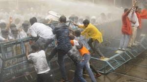 Kolkata Police uses water cannons and tear gas during the Lalbazar March (police Head Quarter)by BJP in Kolkata on Wednesday.(Samir Jana/HT Photo) Kolkata Police uses water cannons and tear gas during the Lalbazar March (police Head Quarter)by BJP in Kolkata on Wednesday.(Samir Jana/HT Photo)