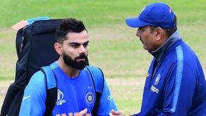 India's captain Virat Kohli (L) talks with India's head coach Ravi Shastri during a nets training session.(AFP) India's captain Virat Kohli (L) talks with India's head coach Ravi Shastri during a nets training session.(AFP)