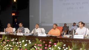 Uttar Pradesh Chief Minister Yogi Adityanath during a review meeting on law and order situation with senior officials at Lok Bhawan, in Lucknow, Wednesday.(PTI) Uttar Pradesh Chief Minister Yogi Adityanath during a review meeting on law and order situation with senior officials at Lok Bhawan, in Lucknow, Wednesday.(PTI)
