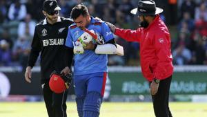 New Zealand's Kane Williamson, left and Umpire Aleem Dar check that Afghanistan's Rashid Khan is alright.(AP) New Zealand's Kane Williamson, left and Umpire Aleem Dar check that Afghanistan's Rashid Khan is alright.(AP)
