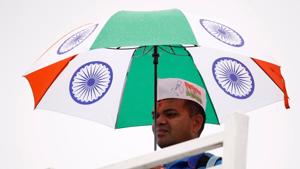 Indian fan holding an umbrella at Trent Bridge(Action Images via Reuters) Indian fan holding an umbrella at Trent Bridge(Action Images via Reuters)