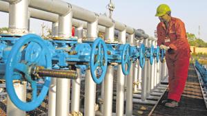 A technician opens a pressure gas valve inside the Oil and Natural Gas Corp (ONGC) group gathering station on the outskirts of Ahmedabad, 2012.(REUTERS) A technician opens a pressure gas valve inside the Oil and Natural Gas Corp (ONGC) group gathering station on the outskirts of Ahmedabad, 2012.(REUTERS)