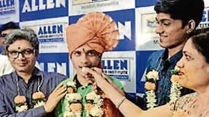 All India JEE Rank 1 Topper Kartikey Gupta with his parents celebrating his success at ALLEN Institute,Andheri(E) in Mumbai, India, on Friday, June 14, 2019.((Photo by Satyabrata Tripathy/Hindustan Times)) All India JEE Rank 1 Topper Kartikey Gupta with his parents celebrating his success at ALLEN Institute,Andheri(E) in Mumbai, India, on Friday, June 14, 2019.((Photo by Satyabrata Tripathy/Hindustan Times))