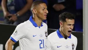 Brazil's Philippe Coutinho celebrates scoring their second goal with Richarlison(REUTERS) Brazil's Philippe Coutinho celebrates scoring their second goal with Richarlison(REUTERS)
