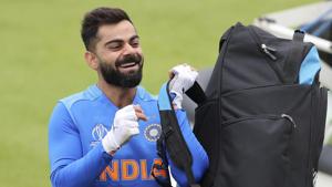 India's captain Virat Kohli lifts his kit before proceeding for batting in the nets during a training session ahead of their Cricket World Cup match against Pakistan at Old Trafford in Manchester(AP) India's captain Virat Kohli lifts his kit before proceeding for batting in the nets during a training session ahead of their Cricket World Cup match against Pakistan at Old Trafford in Manchester(AP)
