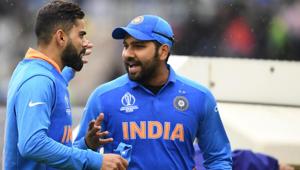 India's captain Virat Kohli (L) speaks with teammate Rohit Sharma(AFP) India's captain Virat Kohli (L) speaks with teammate Rohit Sharma(AFP)