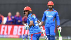 Afghanistan's Hashmatullah Shahidi (C) looks back after his dismissal.(AFP) Afghanistan's Hashmatullah Shahidi (C) looks back after his dismissal.(AFP)