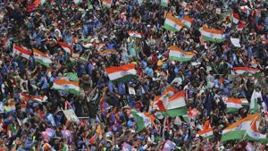 Manchester: Indian fans celebrate a boundary hit by India's Rohit Sharma during the Cricket World Cup match between India and Pakistan at Old Trafford in Manchester, England, Sunday, June 16, 2019(AP)