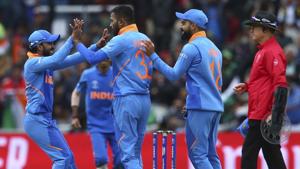 India's Hardik Pandya, center, celebrates with his teammates taking the wicket of Pakistan's Mohammad Hafeez.(AP) India's Hardik Pandya, center, celebrates with his teammates taking the wicket of Pakistan's Mohammad Hafeez.(AP)