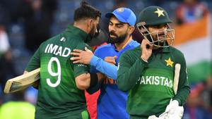 India's captain Virat Kohli (C) embraces Pakistan's Imad Wasim (L) after victory in the 2019 Cricket World Cup group stage match between India and Pakistan at Old Trafford in Manchester, northwest England, on June 16, 2019(AFP) India's captain Virat Kohli (C) embraces Pakistan's Imad Wasim (L) after victory in the 2019 Cricket World Cup group stage match between India and Pakistan at Old Trafford in Manchester, northwest England, on June 16, 2019(AFP)