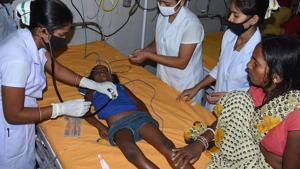 A child suffering from Acute Encephalitis Syndrome (AES) being treated at the government-run Sri Krishna Medical College and Hospital in Muzaffarpur district in Bihar(AFP) A child suffering from Acute Encephalitis Syndrome (AES) being treated at the government-run Sri Krishna Medical College and Hospital in Muzaffarpur district in Bihar(AFP)