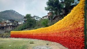 The wall, built with thousands of plastic bottles, has been designed by Subodh Kerkar, founder of museum of Goa.(HT Photo) The wall, built with thousands of plastic bottles, has been designed by Subodh Kerkar, founder of museum of Goa.(HT Photo)