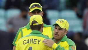 Australia's captain Aaron Finch, right, celebrates with his team after the fall of a wicket.(AP) Australia's captain Aaron Finch, right, celebrates with his team after the fall of a wicket.(AP)