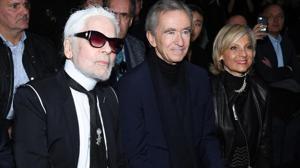 Arnault (centre) entered the luxury-goods market by acquiring a textile group that owned Christian Dior.(Getty Images) Arnault (centre) entered the luxury-goods market by acquiring a textile group that owned Christian Dior.(Getty Images)