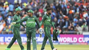 Pakistan's captain Sarfaraz Ahmed, center, and teammates leave at the end of India's innings during the Cricket World Cup match between India and Pakistan at Old Trafford in Manchester, England, Sunday, June 16, 2019(AP) Pakistan's captain Sarfaraz Ahmed, center, and teammates leave at the end of India's innings during the Cricket World Cup match between India and Pakistan at Old Trafford in Manchester, England, Sunday, June 16, 2019(AP)