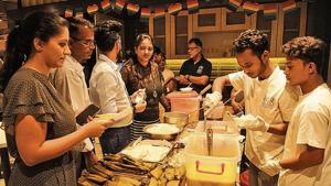 The shy 21-year-old, whose family used to run a chain of restaurants and hotels back home, proudly scooped Shutki for visitors.(HT Photo) The shy 21-year-old, whose family used to run a chain of restaurants and hotels back home, proudly scooped Shutki for visitors.(HT Photo)