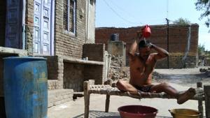 Residents of Adul village on the border of Beed and Aurangabad districts have taken to reusing bathwater for their daily chores, an indication of the dire straits that they find themselves in.(HTPhotos) Residents of Adul village on the border of Beed and Aurangabad districts have taken to reusing bathwater for their daily chores, an indication of the dire straits that they find themselves in.(HTPhotos)