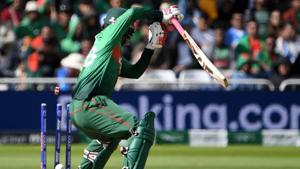 Bails fly as Bangladesh's Tamim Iqbal loses his wicket for 62 runs.(AFP) Bails fly as Bangladesh's Tamim Iqbal loses his wicket for 62 runs.(AFP)