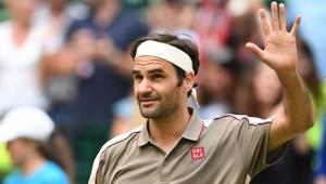 Switzerland's Roger Federer celebrates after winning against France's Jo-Wilfried Tsonga.(AFP)