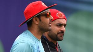 Afghanistan's Mohammad Nabi (L) and Afghanistan's Rashid Khan (R).(AFP) Afghanistan's Mohammad Nabi (L) and Afghanistan's Rashid Khan (R).(AFP)