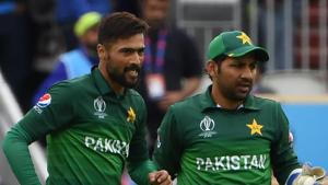 Pakistan's Mohammad Amir (L) with Pakistan's captain Sarfaraz Ahmed.(AFP) Pakistan's Mohammad Amir (L) with Pakistan's captain Sarfaraz Ahmed.(AFP)