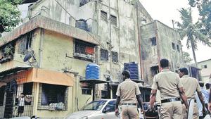 Policemen arrive with NMMC officials to disconnect electric and water supply to dilapidated JN-2 Type Gulmohar Society at Sector 9 in Vashi on Friday. Action was taken against 200 flats in Gulmohar, Jai Maharashtra and Ashirwad — all in the same area.(Bachchan Kumar/ HT) Policemen arrive with NMMC officials to disconnect electric and water supply to dilapidated JN-2 Type Gulmohar Society at Sector 9 in Vashi on Friday. Action was taken against 200 flats in Gulmohar, Jai Maharashtra and Ashirwad — all in the same area.(Bachchan Kumar/ HT)