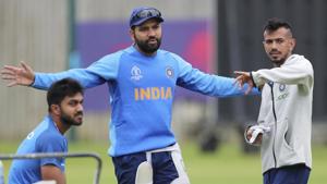 India's Rohit Sharma interacts with teammates Yuzvendra Chahal, right, and Vijay Shankar(AP) India's Rohit Sharma interacts with teammates Yuzvendra Chahal, right, and Vijay Shankar(AP)