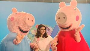 Soha Ali Khan poses with popular cartoon characters, Peppa Pig and George. Soha Ali Khan poses with popular cartoon characters, Peppa Pig and George.
