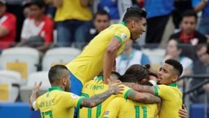 Brazil's Everton celebrates scoring their third goal with team mates(REUTERS) Brazil's Everton celebrates scoring their third goal with team mates(REUTERS)