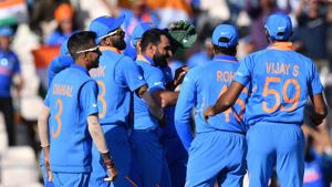 Mohammed Shami (C) celebrates with teammates after his hat-trick.(AFP) Mohammed Shami (C) celebrates with teammates after his hat-trick.(AFP)