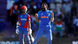 India's Mohammed Shami celebrates taking the wicket of Afghanistan's Mujeeb Ur Rahman to complete a hat trick and win the match(Action Images via Reuters) India's Mohammed Shami celebrates taking the wicket of Afghanistan's Mujeeb Ur Rahman to complete a hat trick and win the match(Action Images via Reuters)