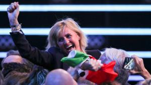 Member of the Italian delegation Diana Bianchedi reacts after the announcement.(REUTERS)