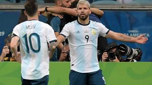 Argentina's Sergio Aguero (R) celebrates with Argentina's Lionel Messi after scoring against Qatar.(AFP) Argentina's Sergio Aguero (R) celebrates with Argentina's Lionel Messi after scoring against Qatar.(AFP)