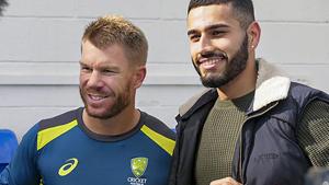Jaykishan Plaha, the net bowler who was struck on the head during a practice session by David Warner, receives a signed jersey from Australia batsman David Warner after his recovery, in London(PTI) Jaykishan Plaha, the net bowler who was struck on the head during a practice session by David Warner, receives a signed jersey from Australia batsman David Warner after his recovery, in London(PTI)