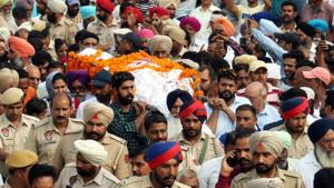 Dera Sacha Sauda followers carry the body of Mohinder Pal Bittu, the main accused in the Bargari sacrilege cases, for cremation, at Kotkapura district Faridkot on Monday, June 24, 2019.(PTI) Dera Sacha Sauda followers carry the body of Mohinder Pal Bittu, the main accused in the Bargari sacrilege cases, for cremation, at Kotkapura district Faridkot on Monday, June 24, 2019.(PTI)