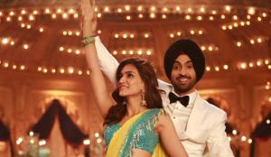 Kriti Sanon and Diljit Dosanjh in a still from Arjun Patiala song Main Deewana Tera. Kriti Sanon and Diljit Dosanjh in a still from Arjun Patiala song Main Deewana Tera.