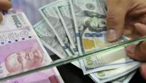 The rupee opened on a weak note and declined 12 paise to 69.48 against the US dollar in opening trade Wednesday(PTI) The rupee opened on a weak note and declined 12 paise to 69.48 against the US dollar in opening trade Wednesday(PTI)