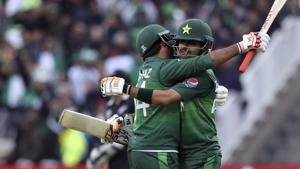 Pakistan's captain Sarfaraz Ahmed, left, imbrues teammate Babar Azam.(AP) Pakistan's captain Sarfaraz Ahmed, left, imbrues teammate Babar Azam.(AP)