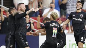 D.C. United forward Wayne Rooney (9) celebrates with teammates.(USA TODAY Sports) D.C. United forward Wayne Rooney (9) celebrates with teammates.(USA TODAY Sports)
