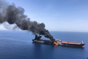 In this June 13, 2019, file photo, an oil tanker is on fire in the sea of Oman. A series of attacks on oil tankers near the Persian Gulf has ratcheted up tensions between the US and Iran -- and raised fears over the safety of one of Asia’s most vital energy trade routes, where about a fifth of the world’s oil passes through its narrowest at the Strait of Hormuz. The attacks have jolted the shipping industry, with many of operators in the region on high alert(AP) In this June 13, 2019, file photo, an oil tanker is on fire in the sea of Oman. A series of attacks on oil tankers near the Persian Gulf has ratcheted up tensions between the US and Iran -- and raised fears over the safety of one of Asia’s most vital energy trade routes, where about a fifth of the world’s oil passes through its narrowest at the Strait of Hormuz. The attacks have jolted the shipping industry, with many of operators in the region on high alert(AP)