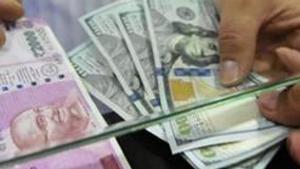 The rupee depreciated 17 paise to 69.32 against the US dollar in opening trade Thursday as strengthening of the American currency in the overseas market weighed on the local unit.(PTI) The rupee depreciated 17 paise to 69.32 against the US dollar in opening trade Thursday as strengthening of the American currency in the overseas market weighed on the local unit.(PTI)