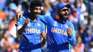 Jasprit Bumrah (L) celebrates with Virat Kohli during their ICC World Cup 2019 encounter against West Indies.(AFP) Jasprit Bumrah (L) celebrates with Virat Kohli during their ICC World Cup 2019 encounter against West Indies.(AFP)